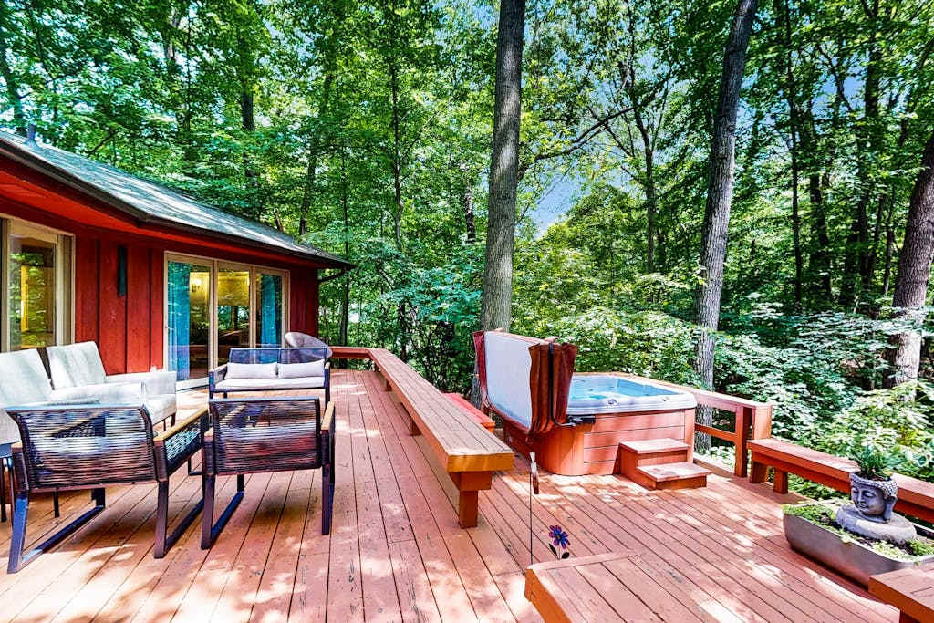 Serene Wooded Home with Private Hot Tub, Firepit & Porch, Dog-Friendly