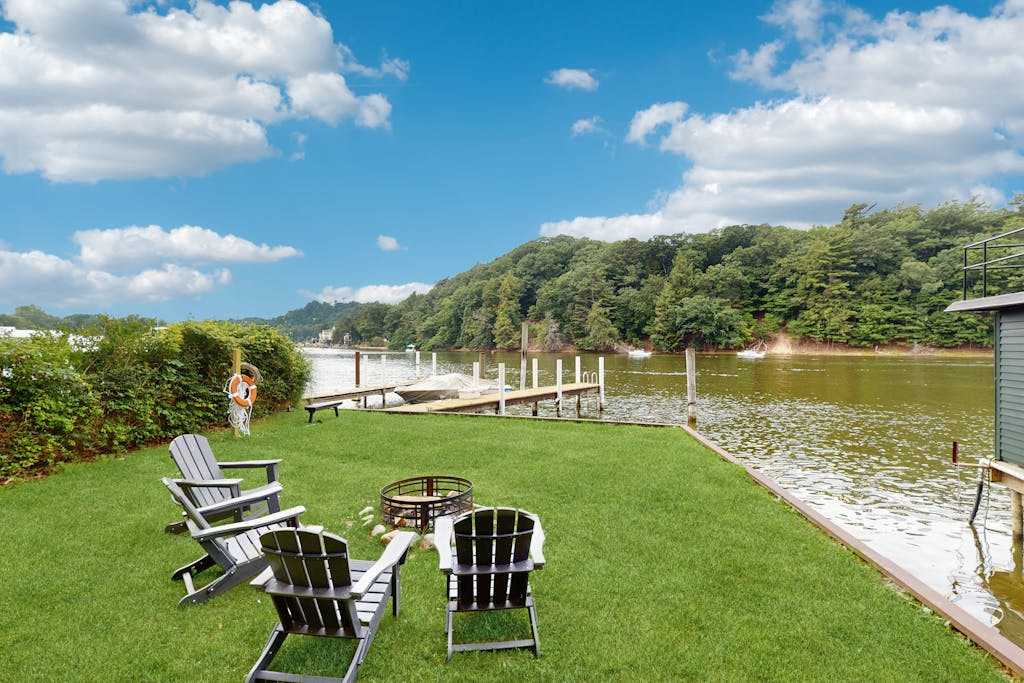 Relaxed Riverside Living with Hot Tub, Private Docks & Kayaks in Saugatuck
