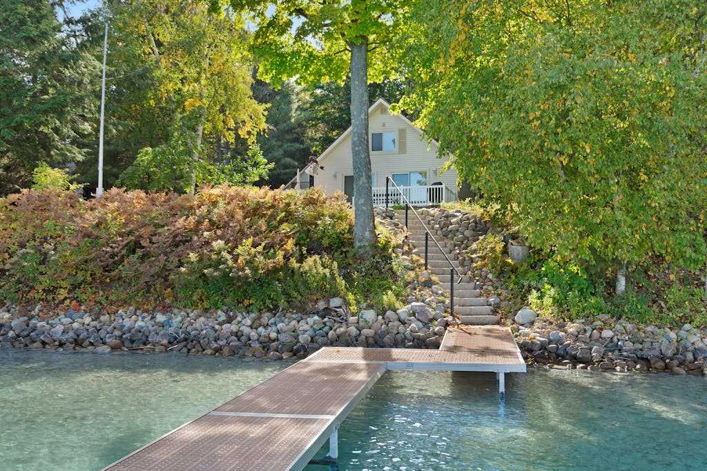 Cottage with lake views, private dock & firepit - near public boat launch