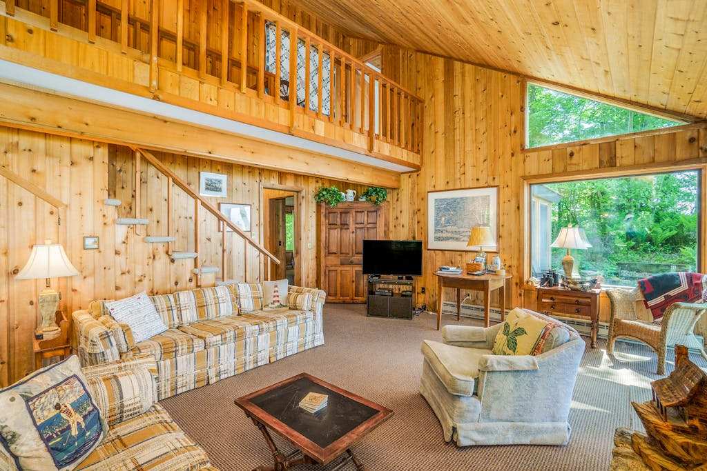 Rustic dream-home with lake views, wraparound deck, & wood-burning fireplace