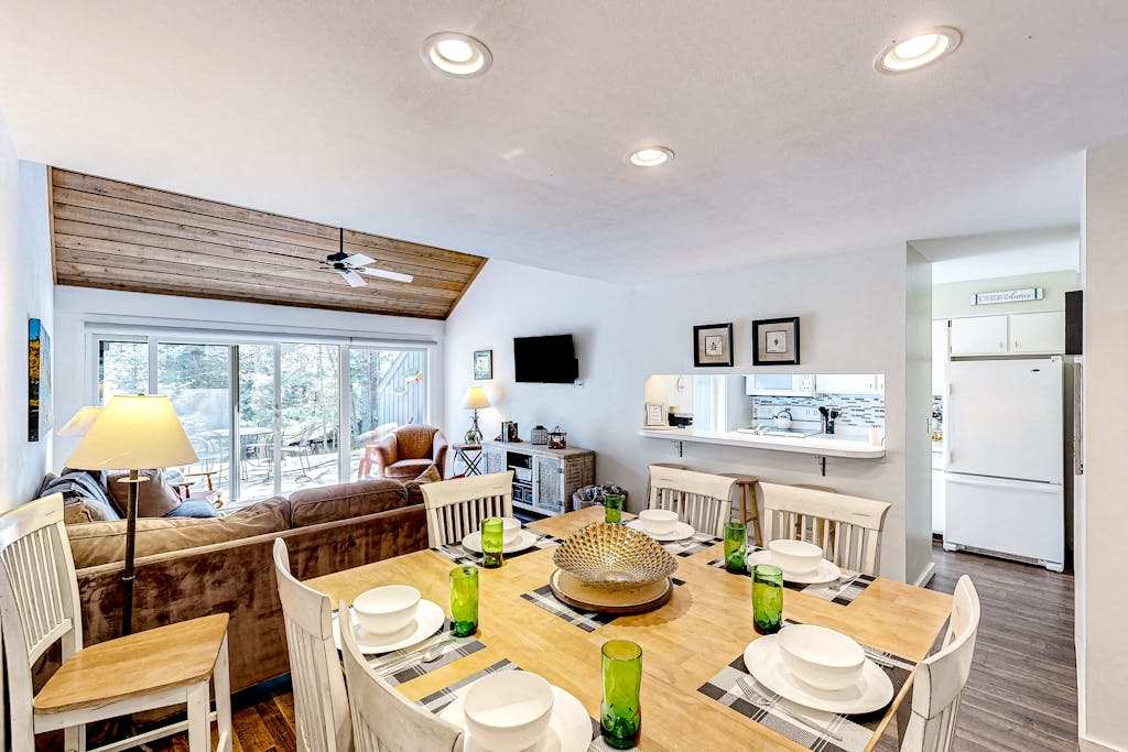 Riverfront condo with lake access, views, deck, washer & dryer, community firepit