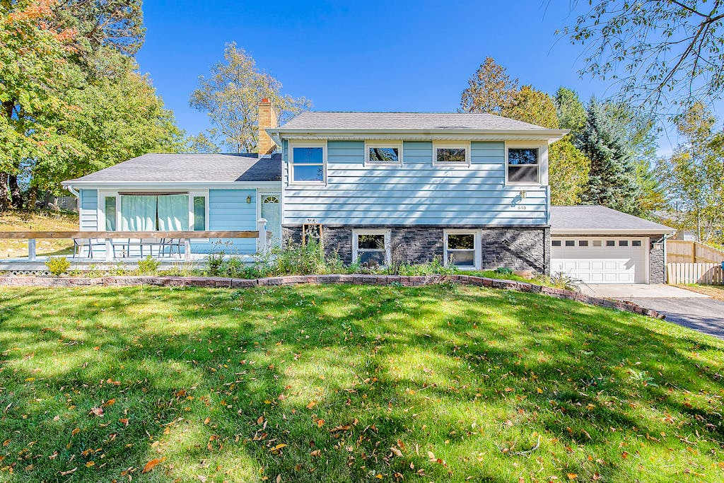 Comfortable home in a great location with enclosed yard, family room, & kayaks