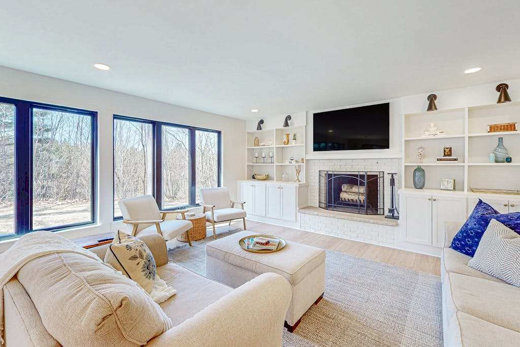 Modern Home in the woods with a large patio, gas grill, & near the lake