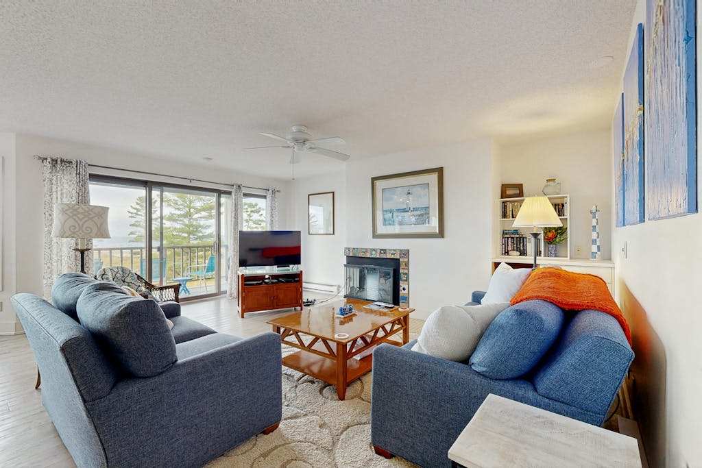 Cheery beachfront condo in Glen Arbor's Homestead Resort with deck & fireplace