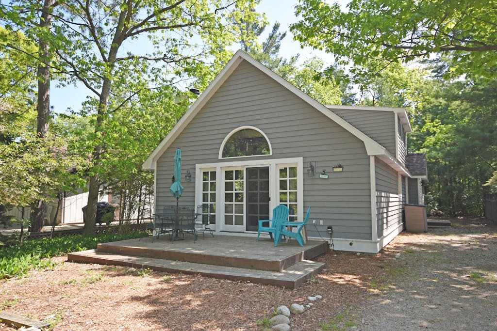 Charming home near the lake with a fireplace, central AC, washer & dryer & grill
