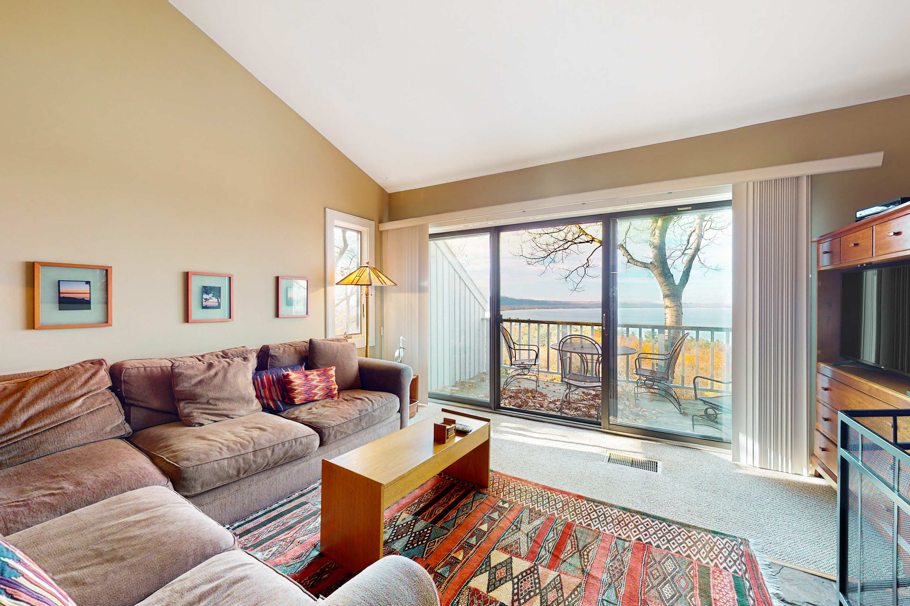 Updated condo in Glen Arbor with Lake Michigan views, fireplace, deck, washer & dryer