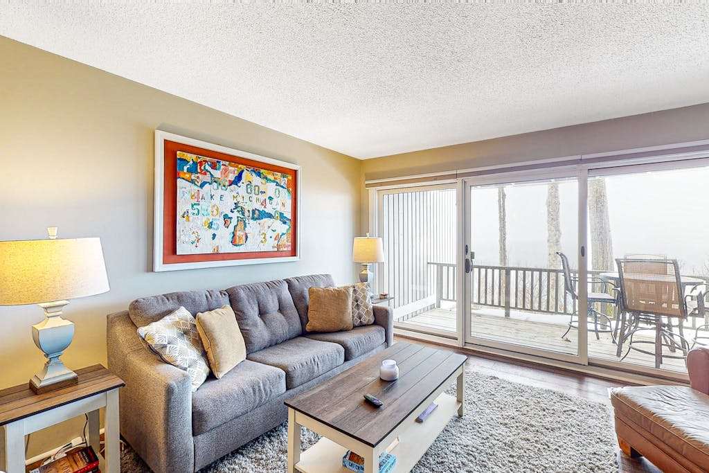 Bayfront condo with lake & bay views, deck, 2 fireplaces, private washer & dryer