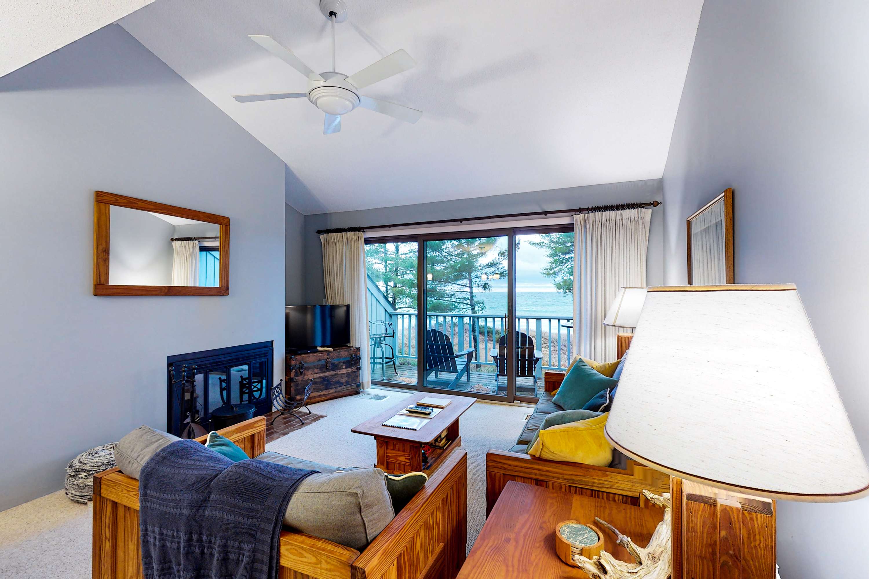 Beachfront condo with beach access, fireplace, balcony, washer & dryer & views