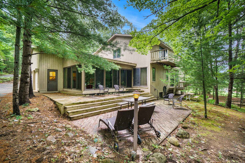 Secluded home with three kitchens, vaulted ceilings, washer & dryer, & patios