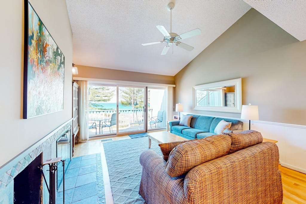 Waterfront condo near skiing with beach access, on-site golf & fireplace