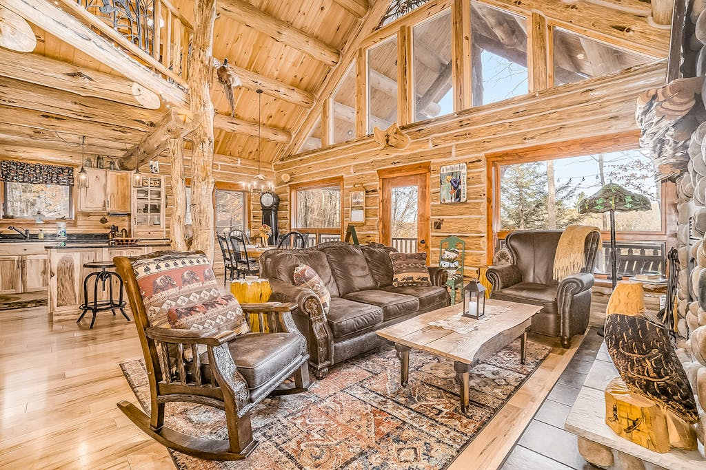 Delightful Riverfront Cabin with Wood-Burning Fireplace and Gas Grill & Hot Tub