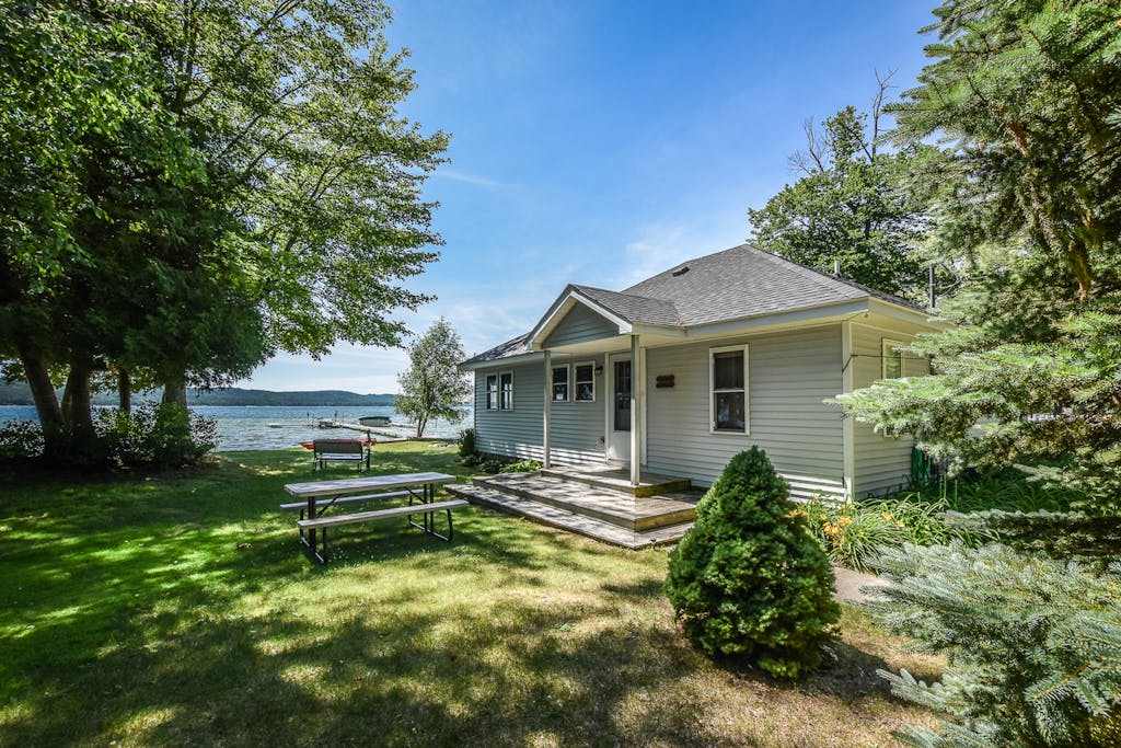 Dog-friendly and lakefront home with firepit close to restaurants and shops