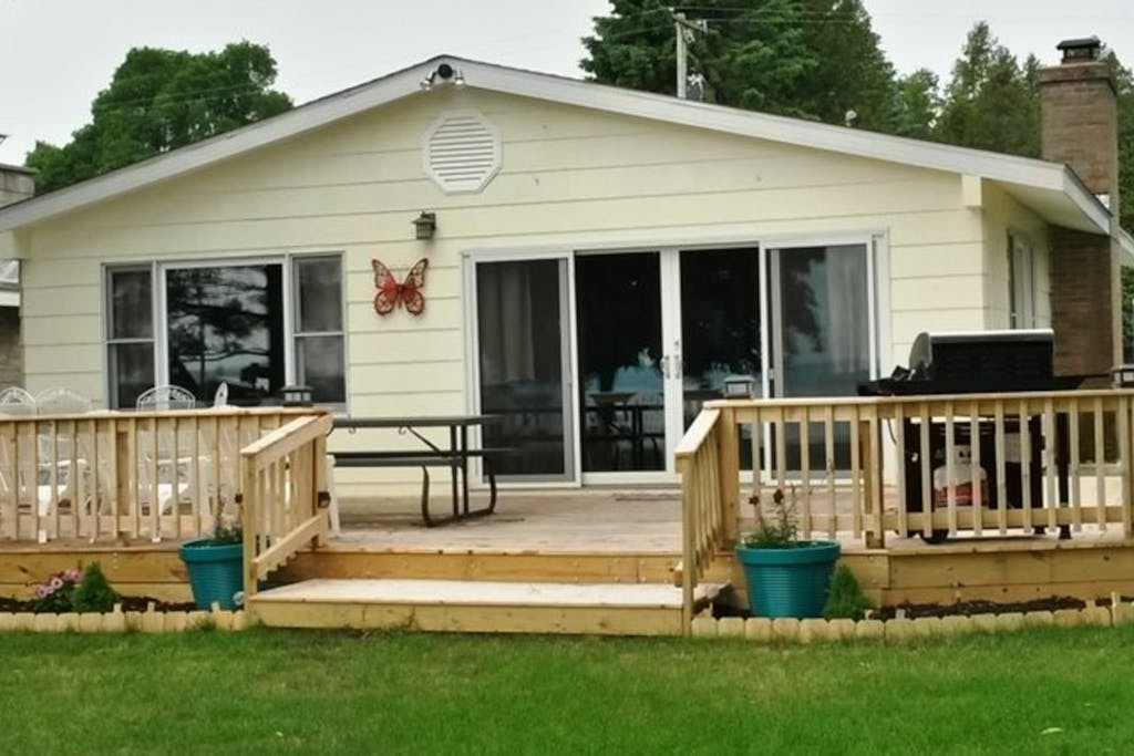 Remodeled, waterfront home on Portage Lake with dock & firepit - 2 dogs OK