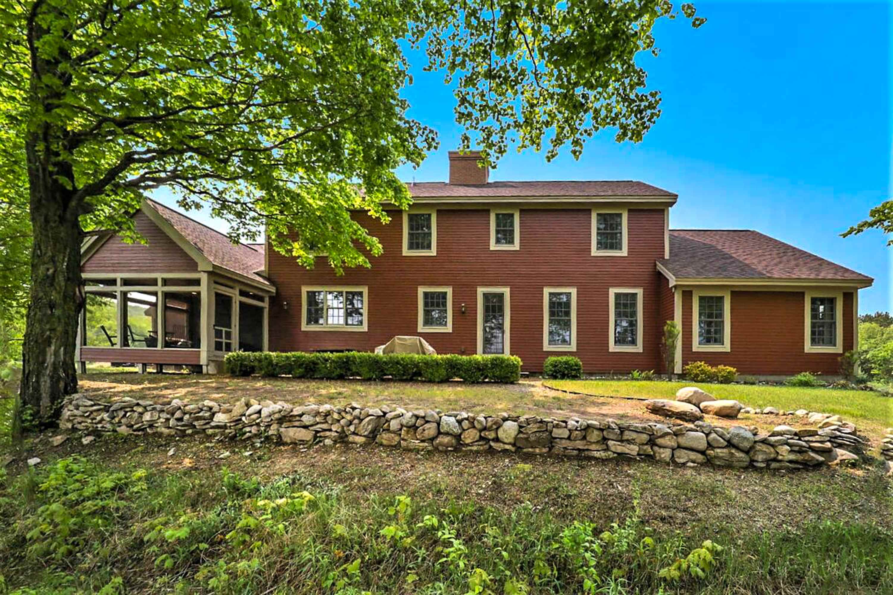 Exquisite Cape Cod home with large yard, fireplace, central AC, & washer & dryer