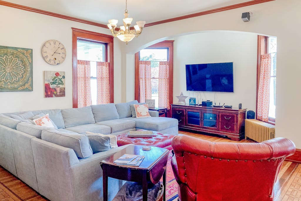 Historical dog-friendly home with fenced yard, grill, Ping-Pong, fireplace, & AC