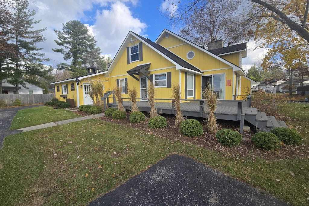 Cottage on the canal to Burt Lake with large patio and space for boat