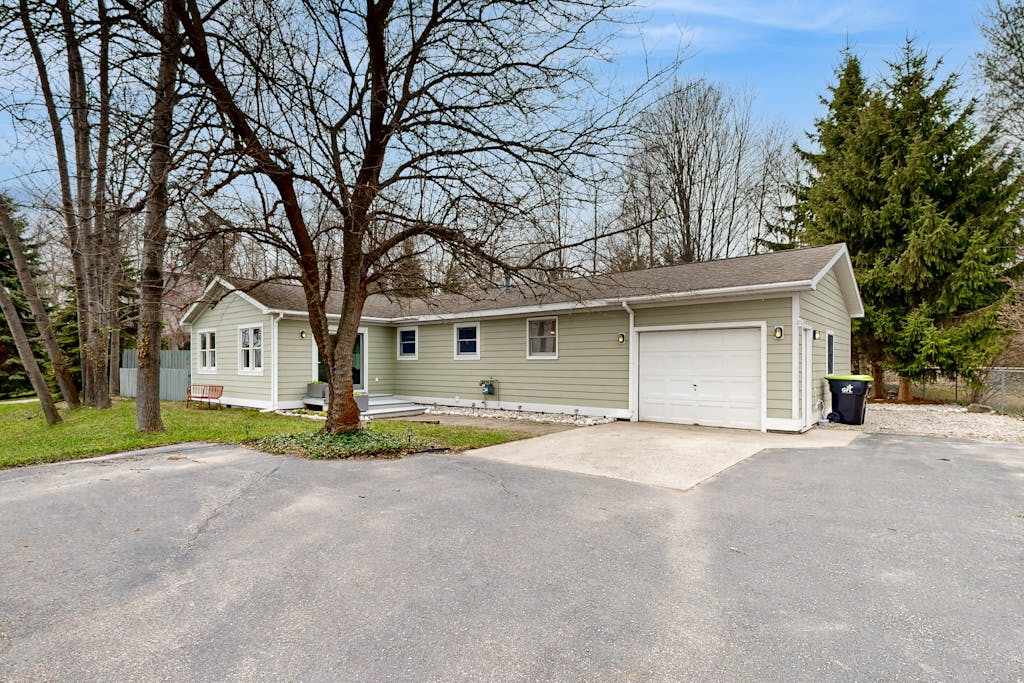 Tranquil Lakeview Retreat in Suttons Bay, with a private sauna, & large yard
