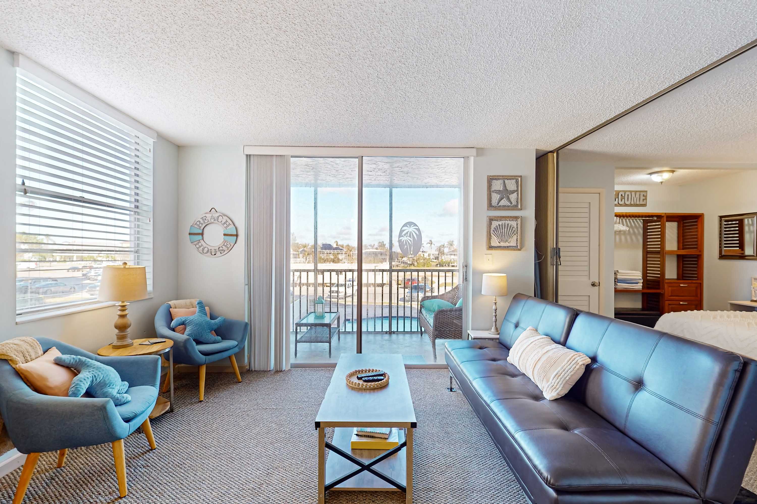 Renovated Beachfront Condo - Modern Comfort River Views & Endless Relaxation!