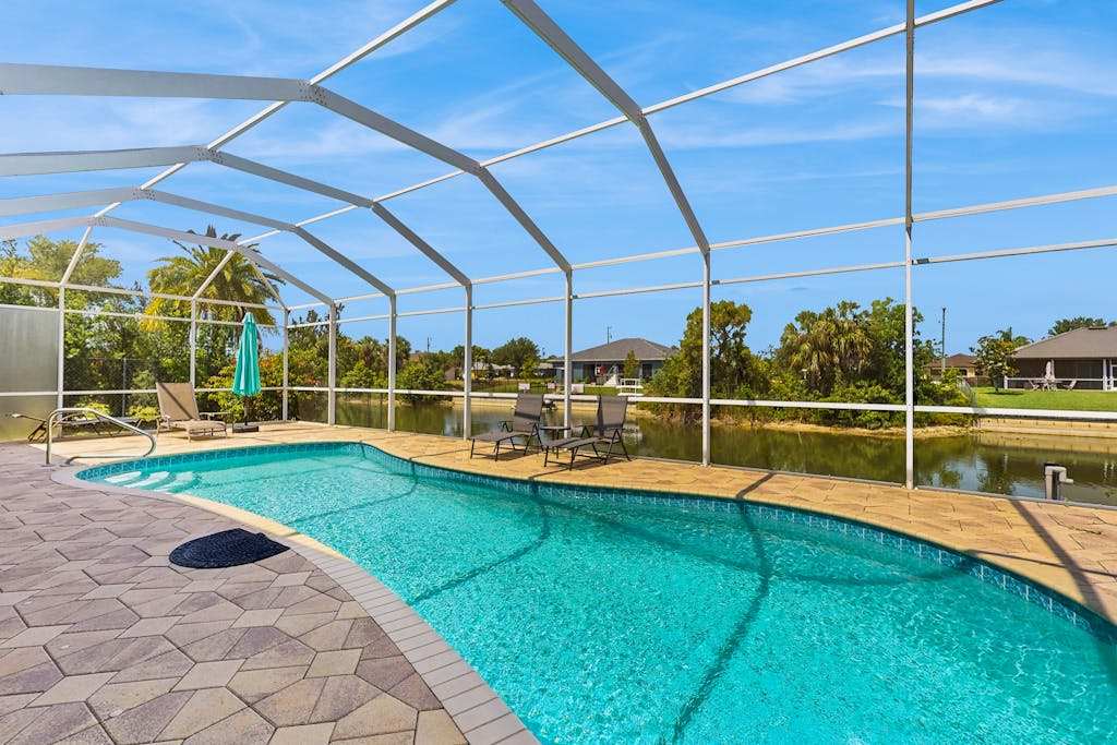 Spacious dog friendly home with private pool canal views & private grill