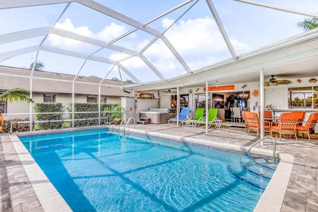 Canal front home with private pool hot tub dock & kayaks & paddleboards - 1 dog OK