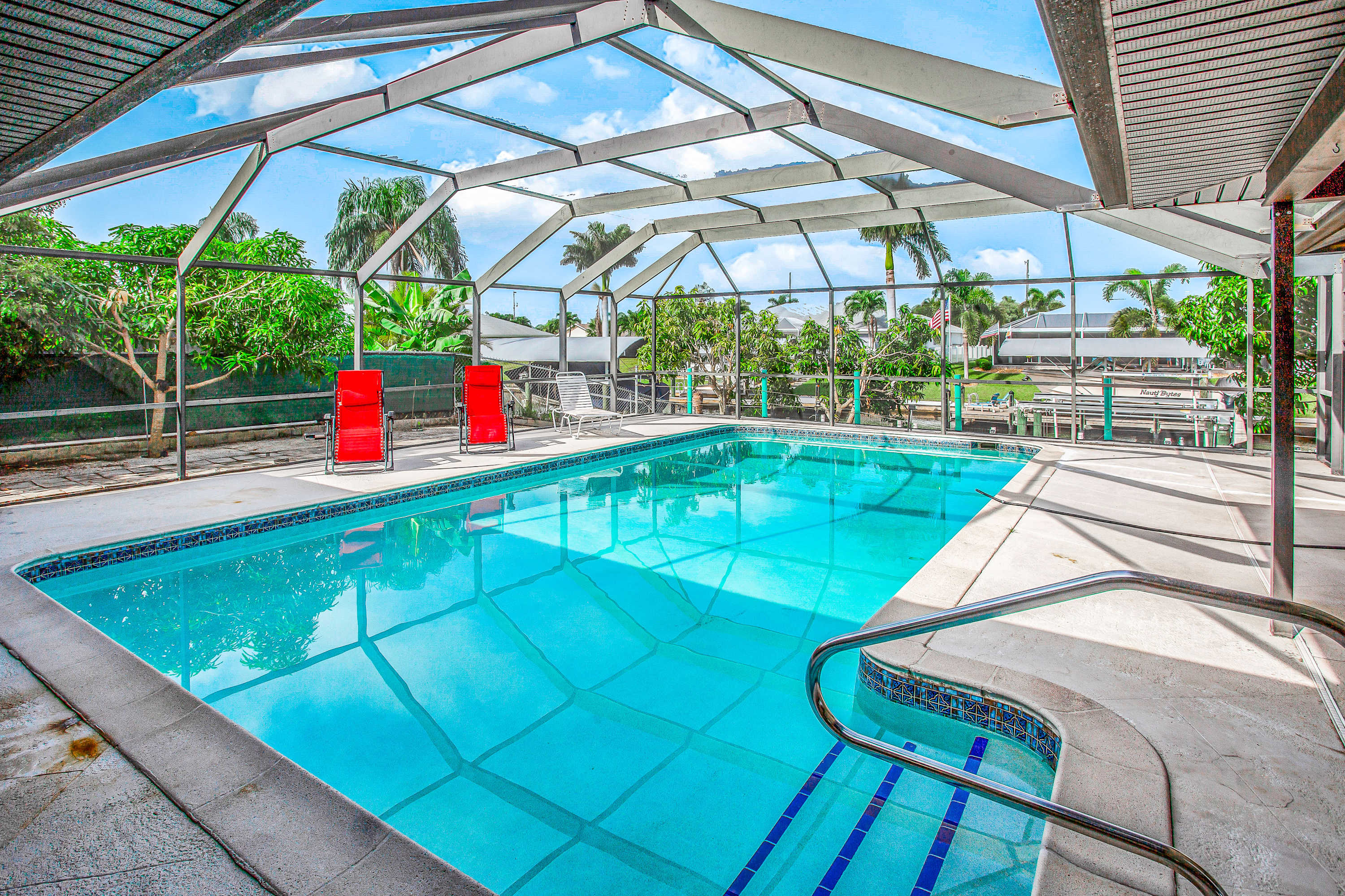 Spacious waterfront home with private pool & grill near downtown