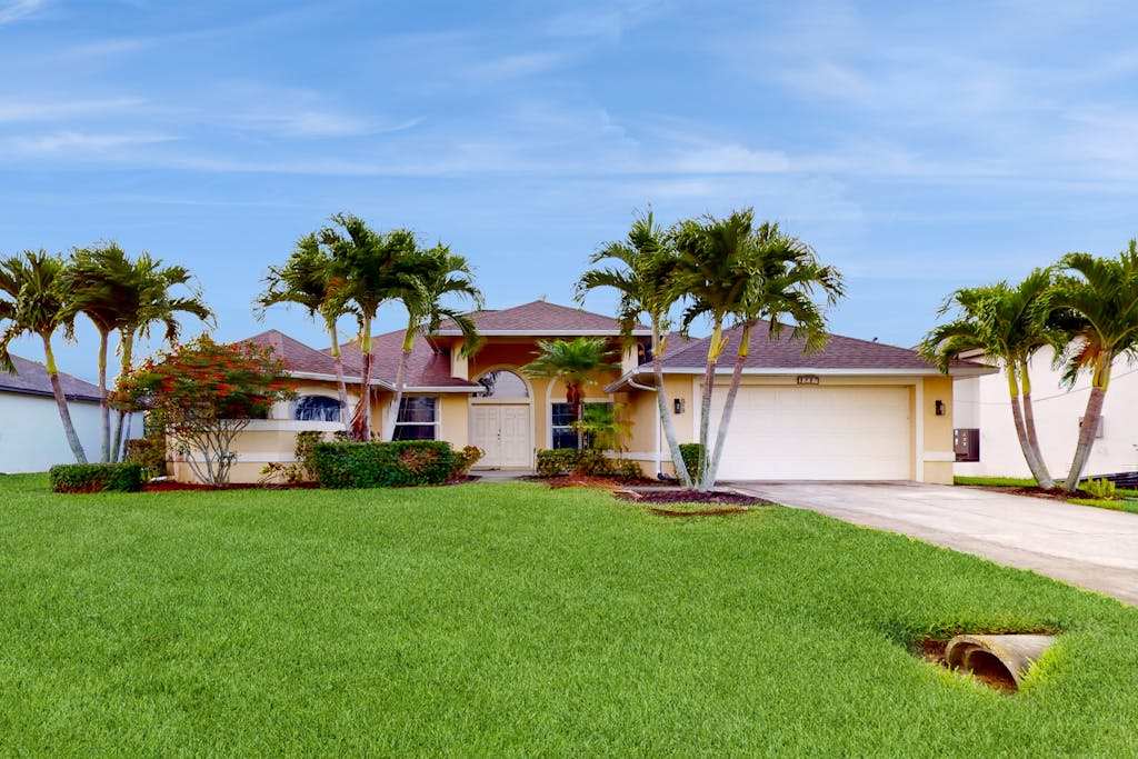 Luxe Tropical Retreat with Screened Lanai Private Pool Dock & Billiards