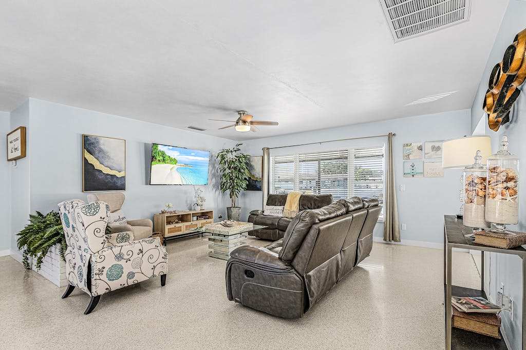 Updated Waterfront Escape Dock & Easy Gulf Access with short Walk to Beach & Tennis