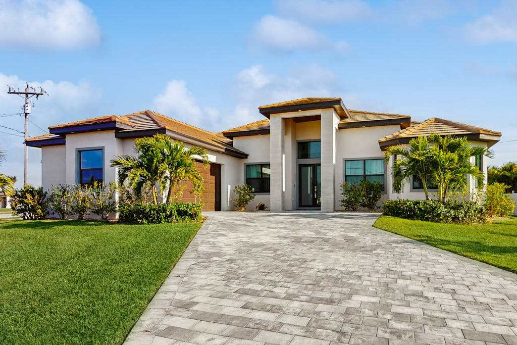 Modern canal front luxury with pool patio grill dock Ping Pong AC & WiFi