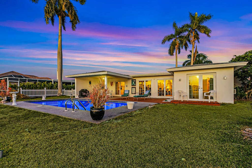 Private Canal Front Retreat with Pool Lanai Patio & Waterfront Deck