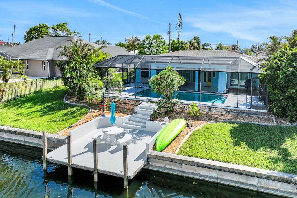 Dog Friendly Enchanting waterfront home with solar warmed pool