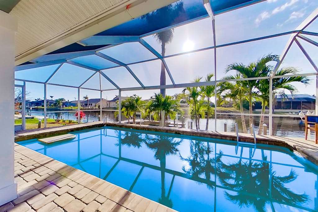Fully updated canal front home with pool washer & dryer & central AC great location