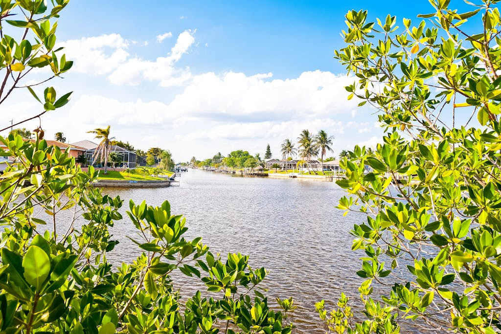 Dog friendly lake view getaway with pool & all suite layout walkable locale