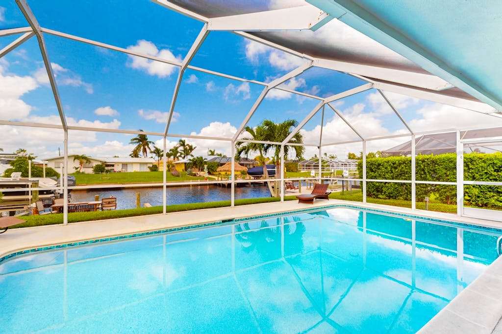 Inviting dog friendly home with pool water view central AC & washer & dryer