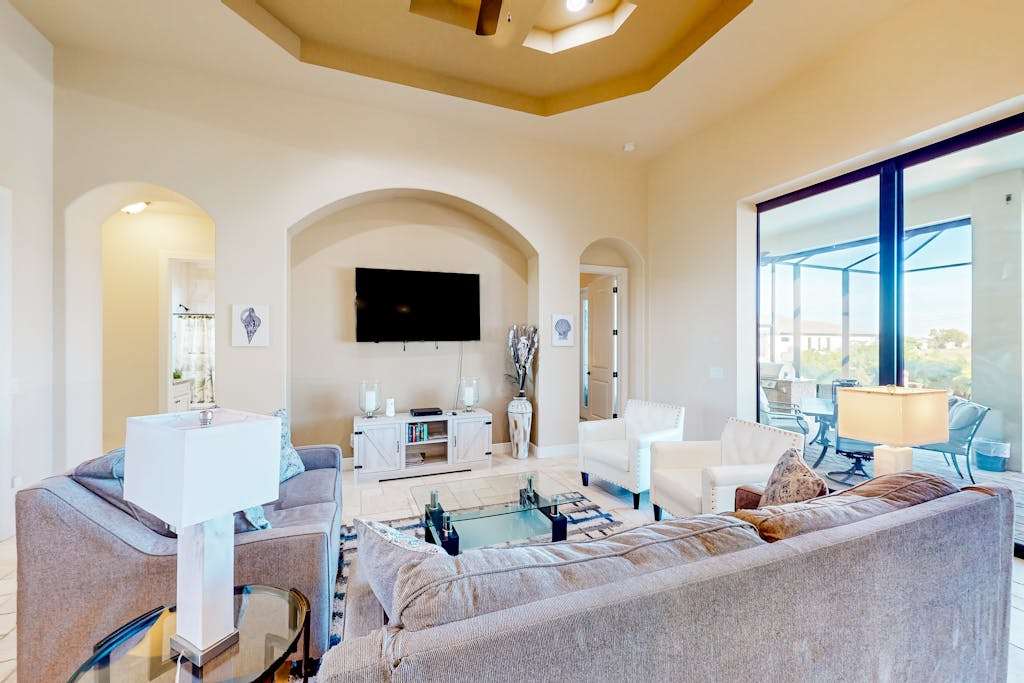 Amazing dog friendly riverfront oasis with private pool patio dock & EV charger