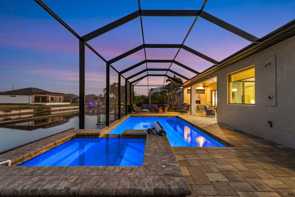 Open home with heated pool dock grill beach gear smart TVs washer & dryer & AC