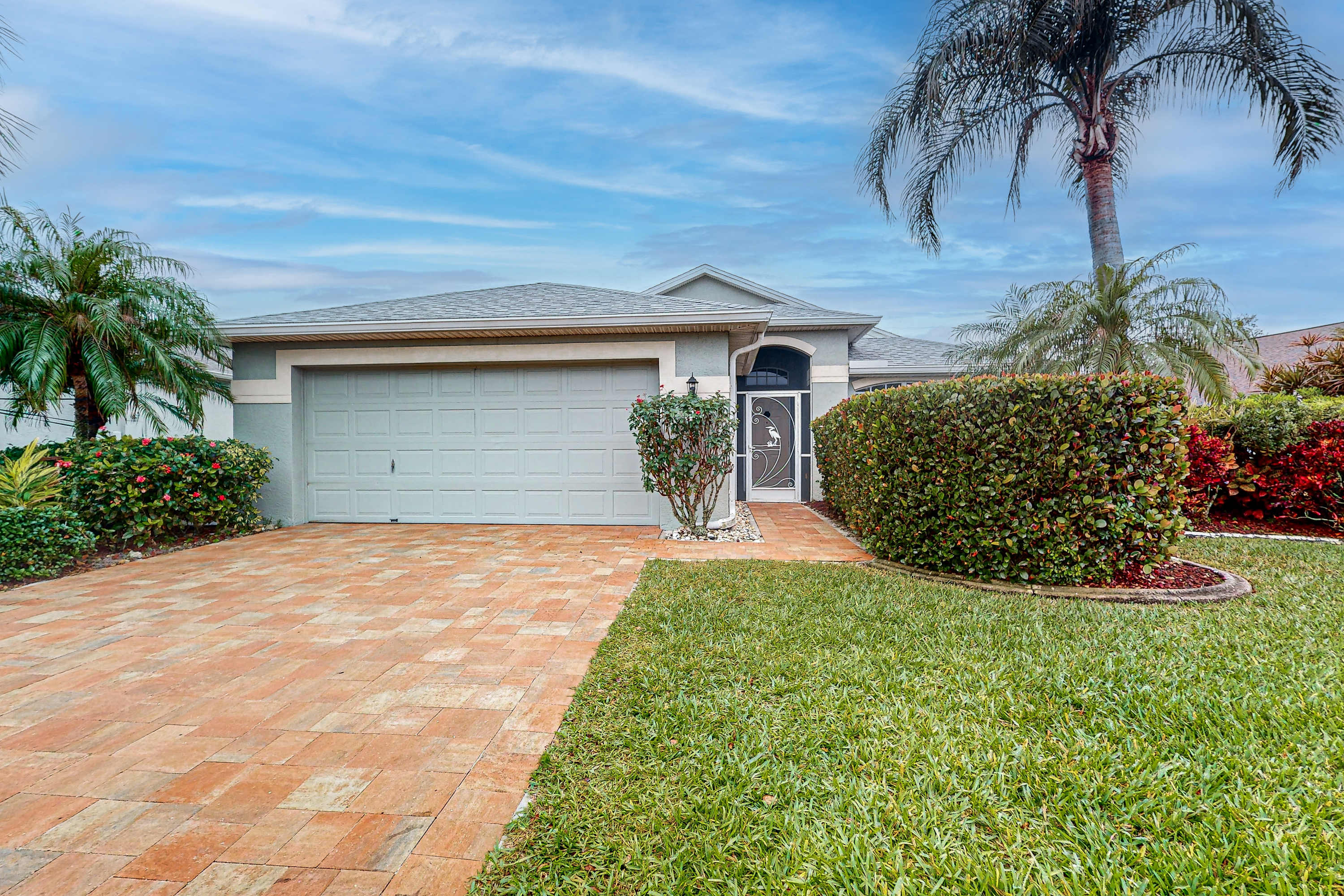 Waterside Home with Private Covered Pool & Patio Golf Courses Nearby