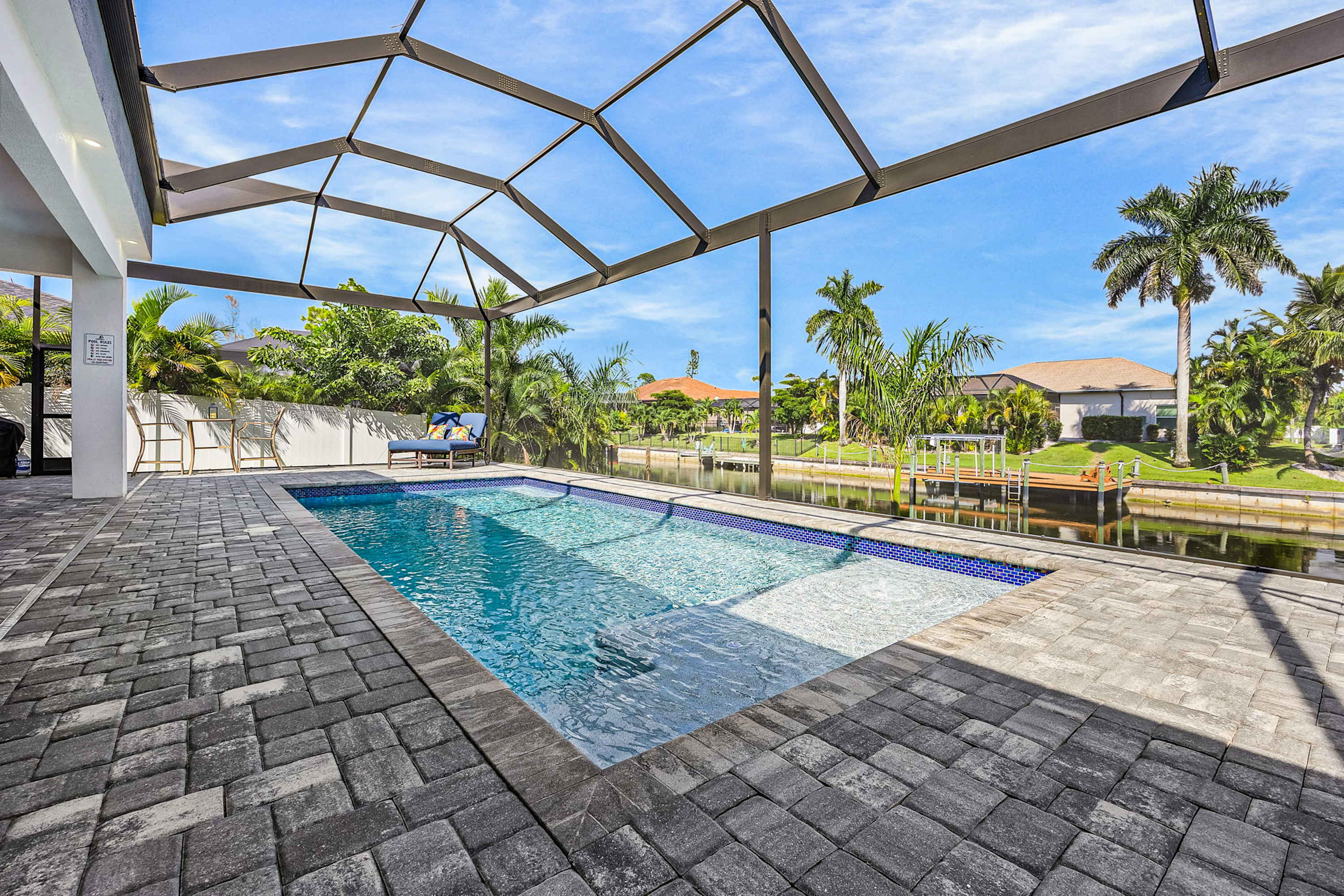 Sophisticated & serene home on waterway sparkling pool fireplace washer & dryer & AC