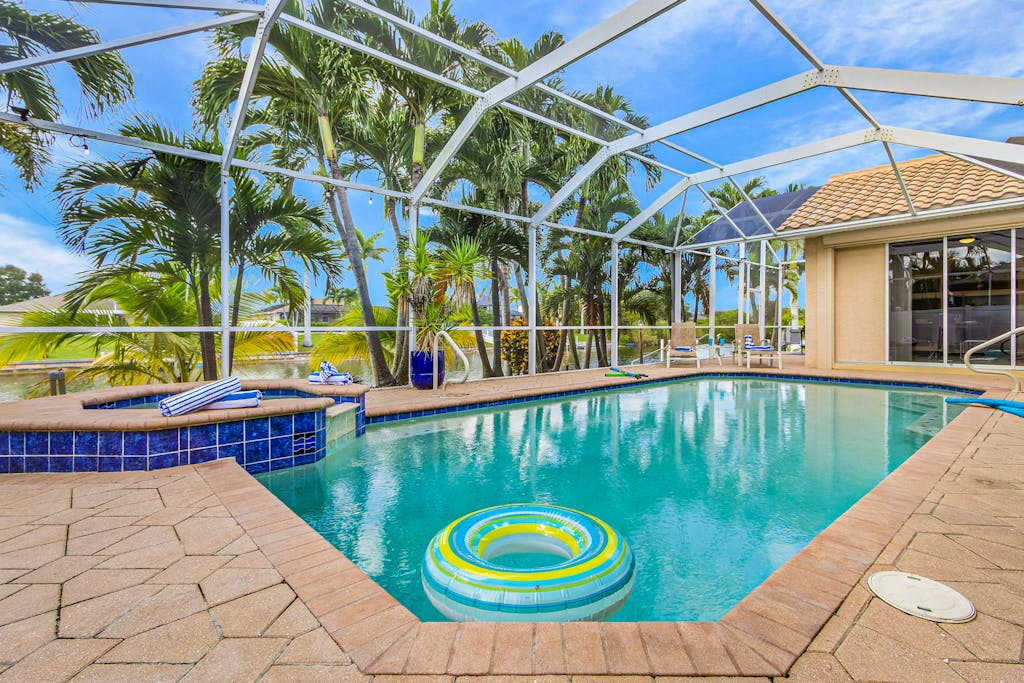 Exceptional waterfront home refreshing pool spa family & dog friendly