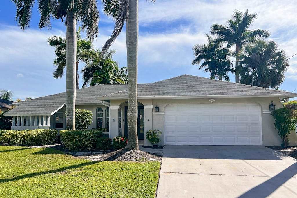 Waterfront home with pool family & dog friendly close to river & Gulf beaches