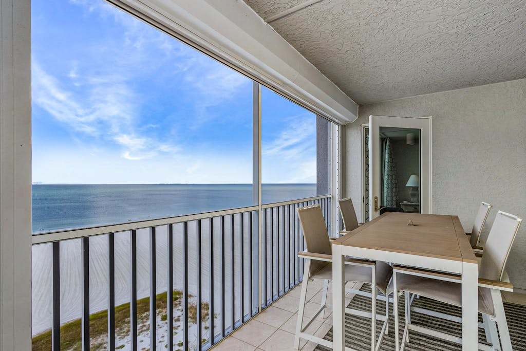 Waterfront penthouse with beach views pool hot tub & tennis court