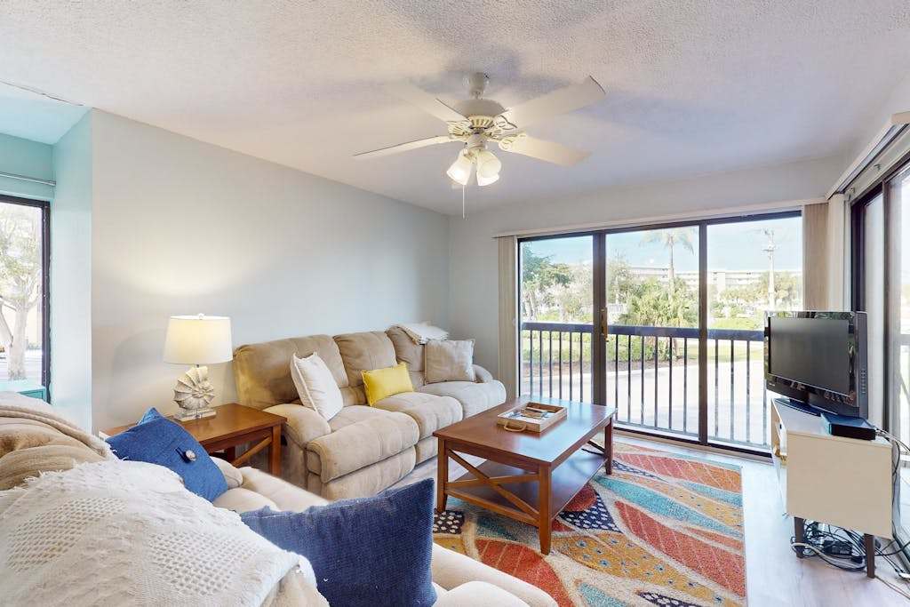 Corner Unit Condo with Private Balcony & Shared Pool Walk to Beach