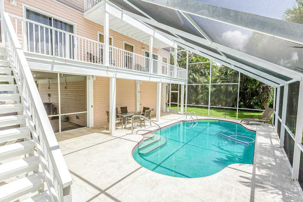 Group getaway with private pool & lanai walk to Fort Myers Beach & Estero Bay