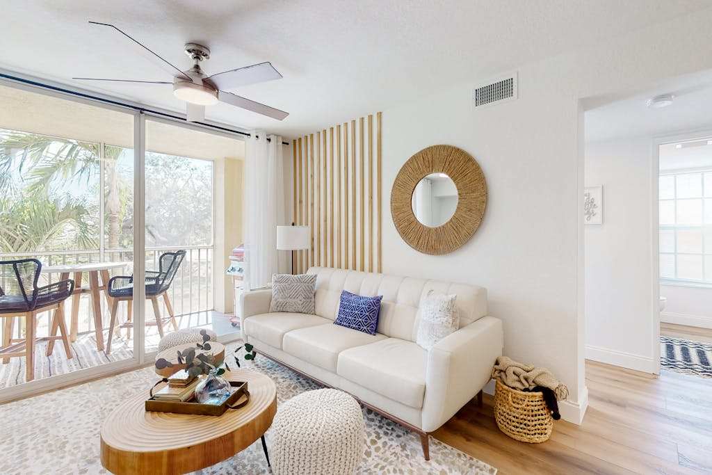 Beautiful bright condo with a balcony & washer & dryer pool gym & game room access