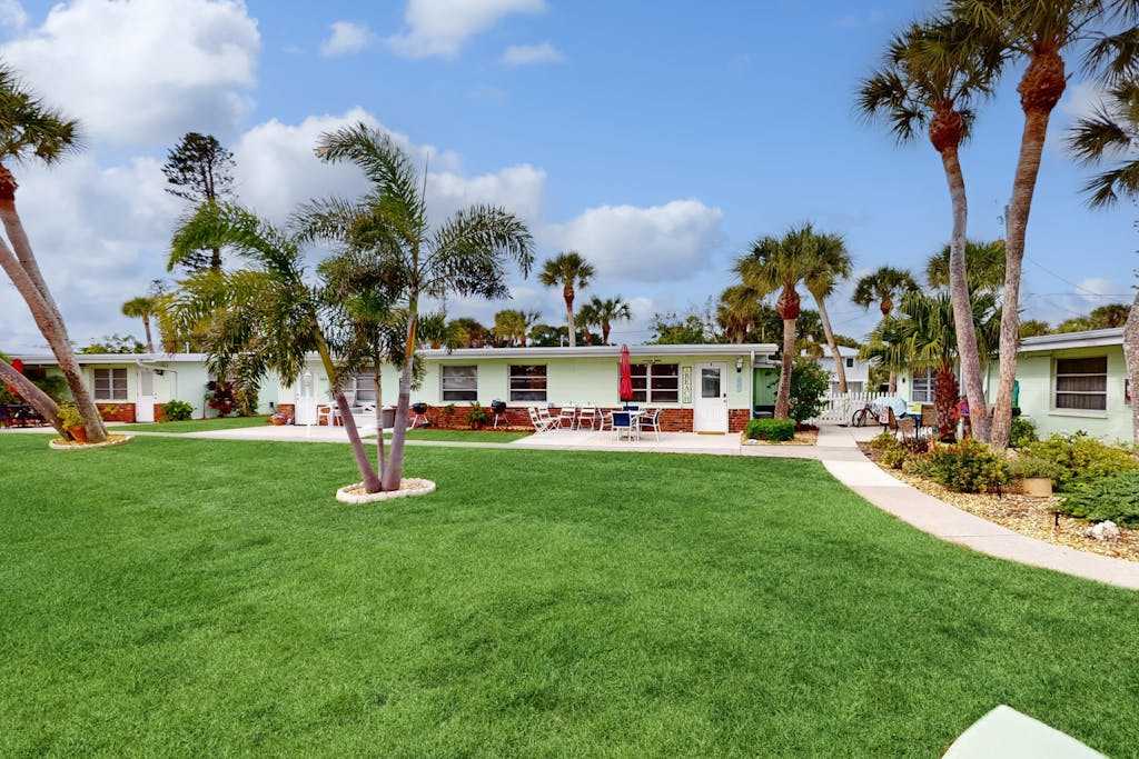 Canal front condo with private docks heated pool private beach access BBQ