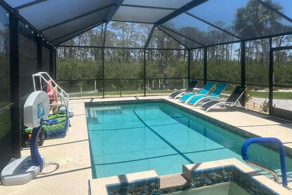 Outdoor paradise on waterway with pool & spa beach gear & dog friendly