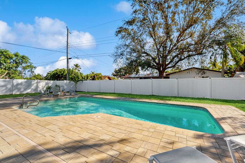 Coastal home with private pool arcade games & firepit