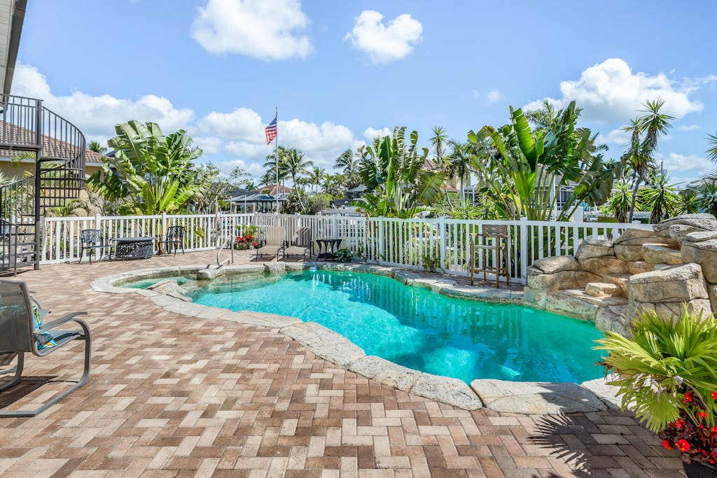 Canal front home with private lagoon pool dock AC & washer & dryer dog friendly