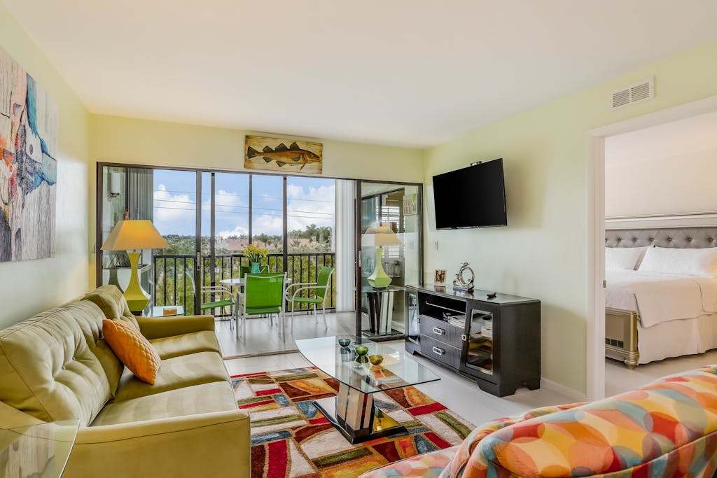 Snowbird friendly condo with AC lanai pool hot tub tennis & on site dining