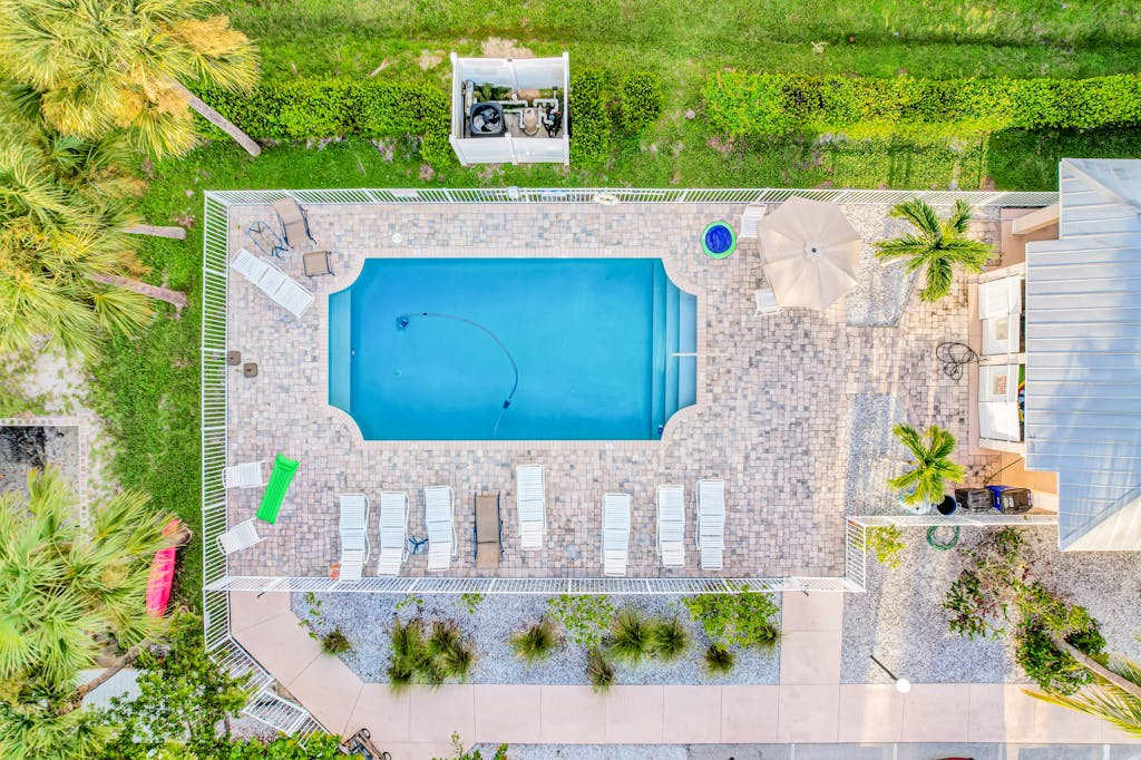 Water view villa with sunset balconies grill & pool walk to beach & dining