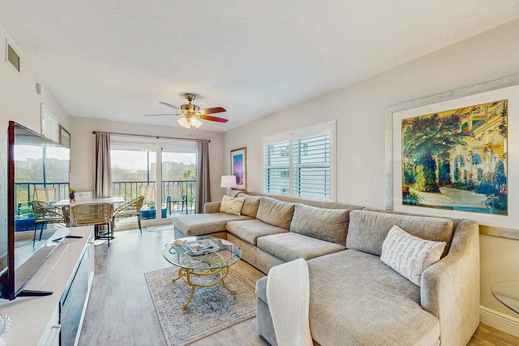Coastal condo with shared pool tennis court & washer & dryer